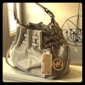 Michael Korea’s vanilla leather handbag.